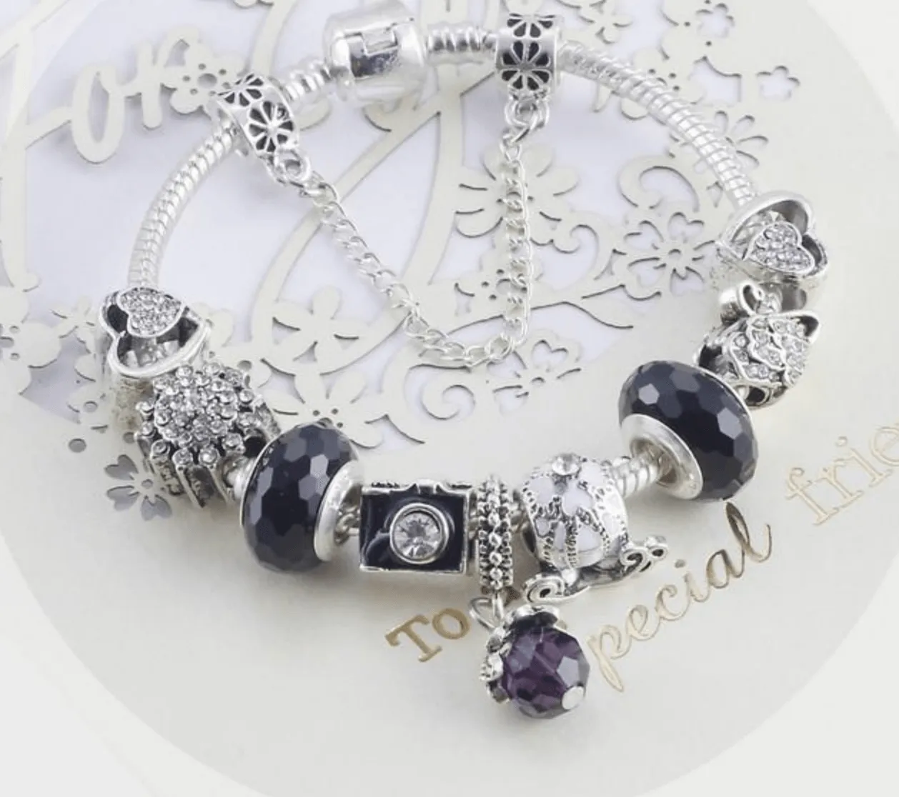 Charming Black and Silver bracelet with Heart-themed charms