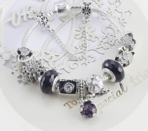 Charming Black and Silver bracelet with Heart-themed charms