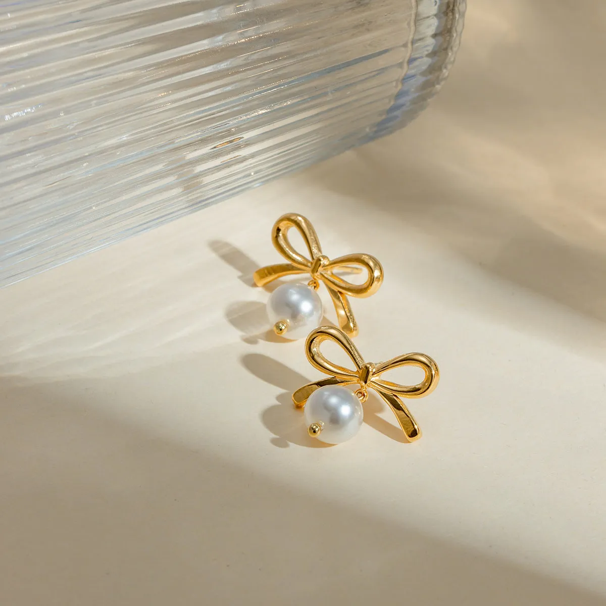 Elegant Bow Faux Pearl Stainless Steel Earrings