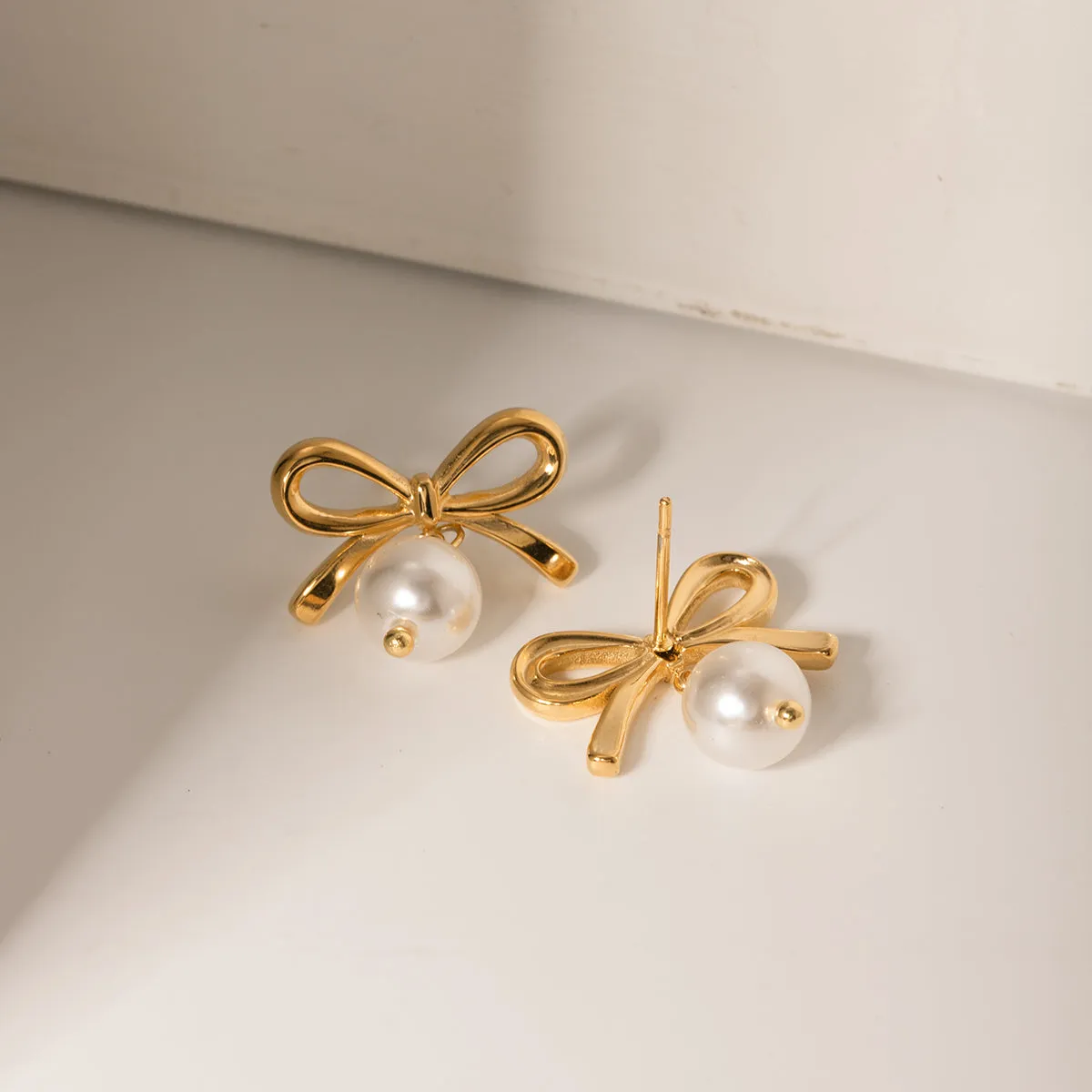 Elegant Bow Faux Pearl Stainless Steel Earrings