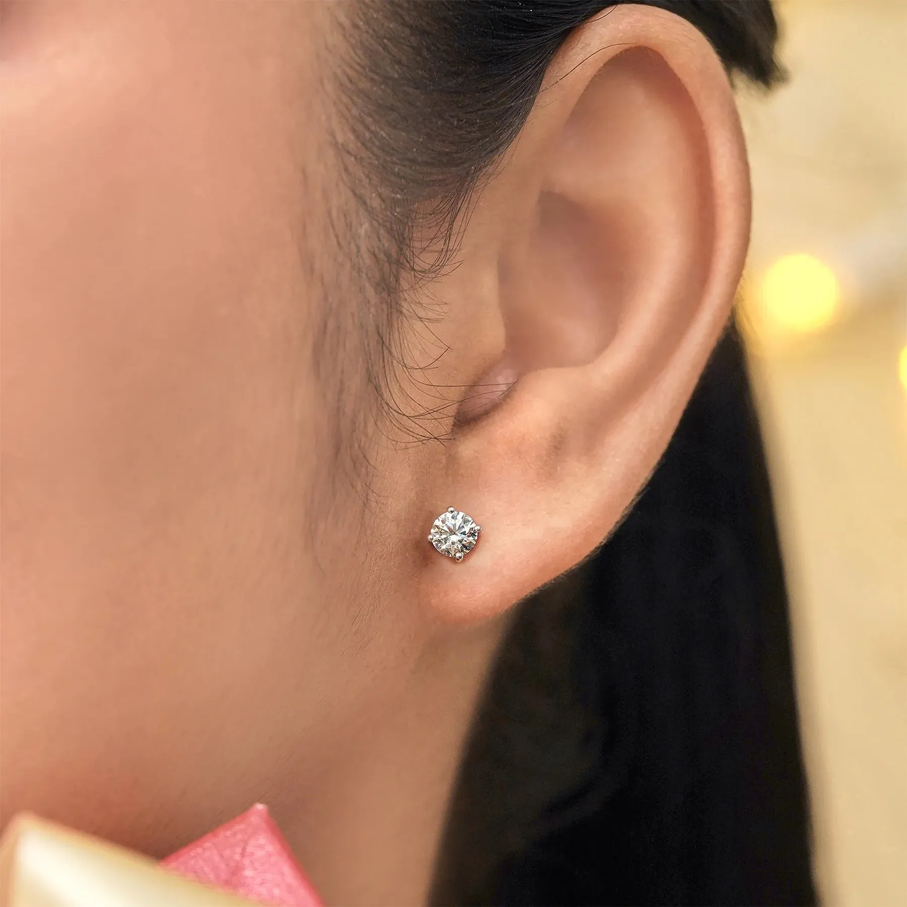 JeenMata 4 Prong 0.5 Carat Round Shaped Moissanite Solitaire Stud Earrings In 18K White Gold Plating Over Silver